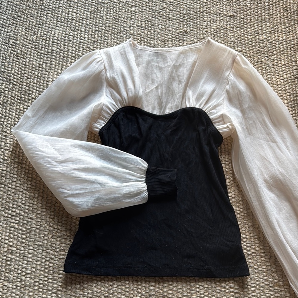 J.ING Black and Ivory Asymmetrical Blouse with Bishop Sleeves